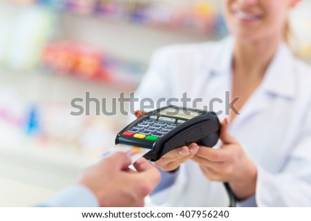 Paying in the Pharmacy
 Royalty-Free Stock Photo #407956240