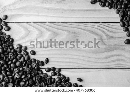 Coffee beans on the table. Free space for your text , black and white