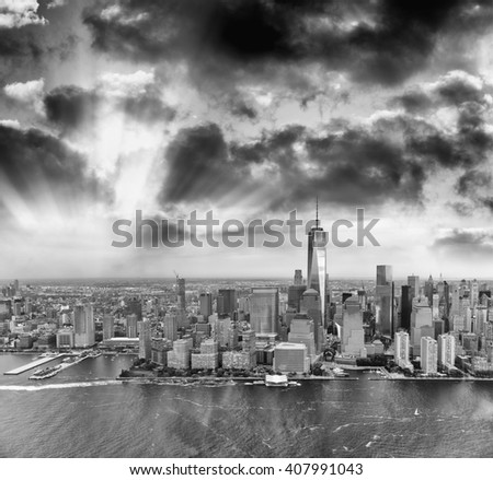Black and white view of Downtown Manhattan skyline, New York City at sunset.