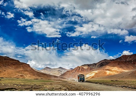 Indian lorry on Trans-Himalayan Manali-Leh highway in Himalayas. Ladakh, Jammu and Kashmir, India Royalty-Free Stock Photo #407996296