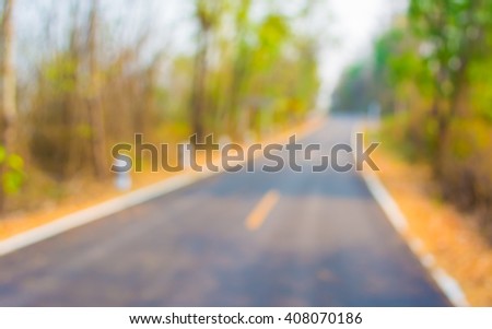 Image of Abstract  blur road on day time for background usage .