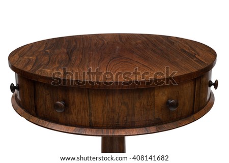 Cut-out of the top and the side drawers of a vintage wooden drum end table. Royalty-Free Stock Photo #408141682