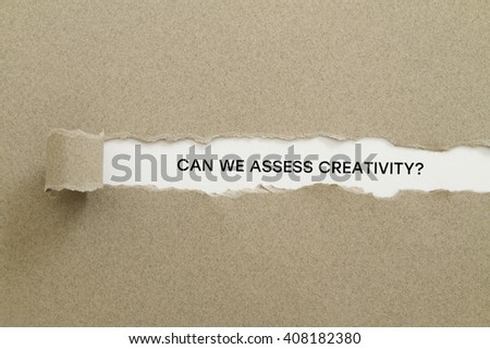 Can We Assess Creativity? question written under torn paper.