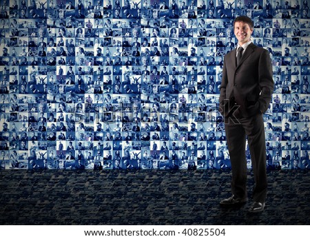 businessman with composition of portraits on the background