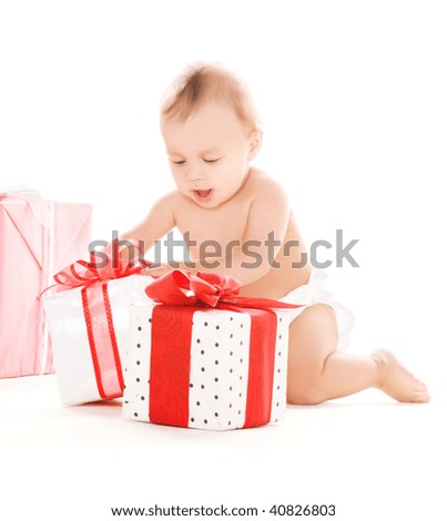 picture of baby boy with gifts over white