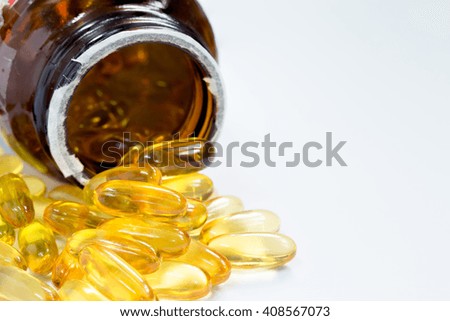 Fish oil capsule is nutrition food for healthy background with a copy space.