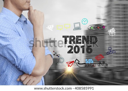 young man stand and thinking with TREND 2016 text ,business concept 