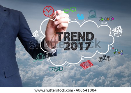 businessman hand draw cloud , icon cartoon with TREND 2017 text 