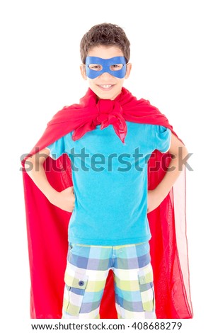 little boy pretending to be a superhero