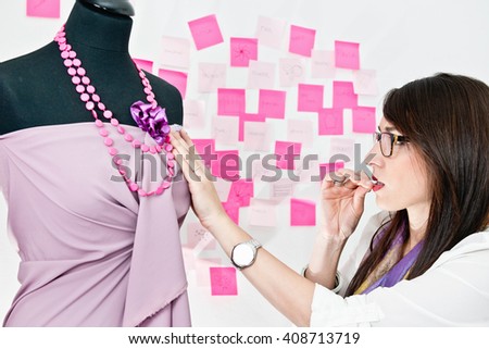 Fashion designer working on prom dress