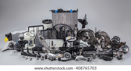 car parts on a gray background Royalty-Free Stock Photo #408765703