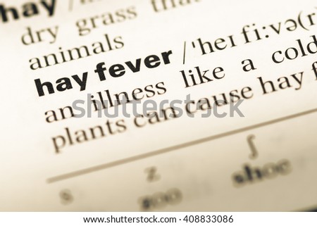 Close up of old English dictionary page with word hay fever