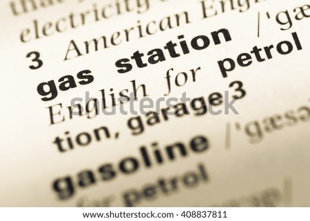 Close up of old English dictionary page with word gas station