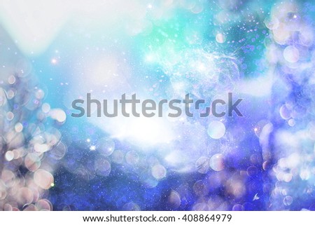 abstract blurred and silver glittering shine bulbs lights background:blur of Christmas wallpaper decorations concept.holiday festival backdrop:sparkle circle lit celebrations display