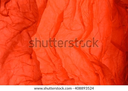 Texture of red striped crumpled paper for pattern background