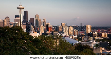 Seattle skyline at sunset with the snow cap of Mt. Rainier in the background