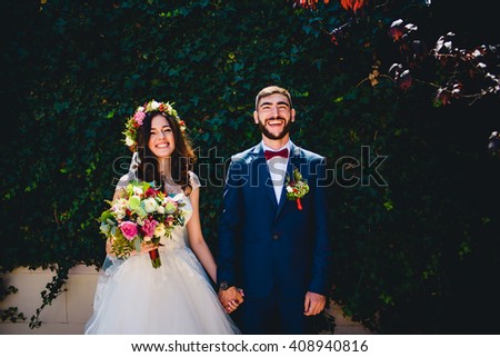 wonderful young people look at the photographer and rejoice Royalty-Free Stock Photo #408940816
