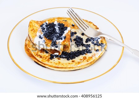 Pancakes with Black Caviar Studio Photo