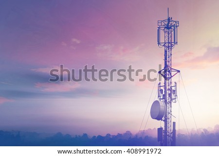 Telecommunication tower Antenna at sunset sky. Royalty-Free Stock Photo #408991972