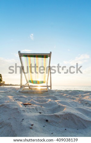 Beach chair and beautiful sunset