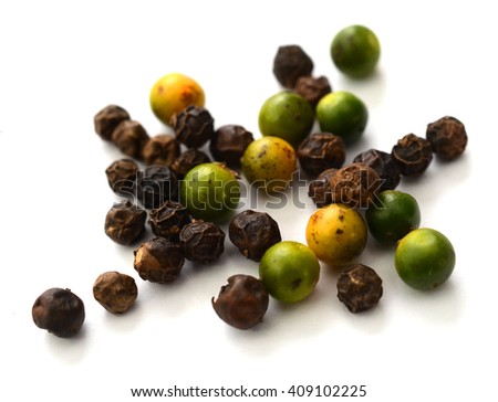 grains of black pepper isolated on white background
