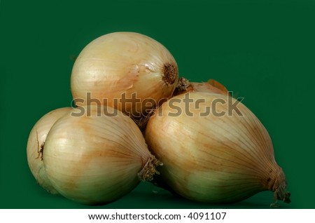 Some onions on green background
