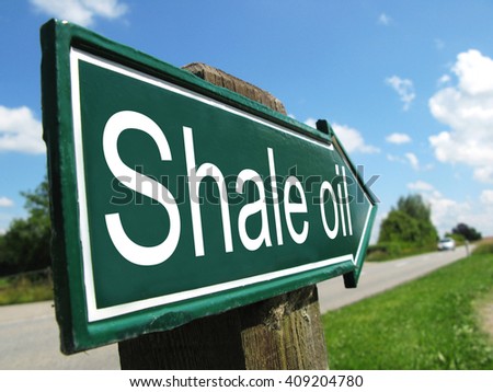 Shale oil (alternative energy) signpost along a rural road