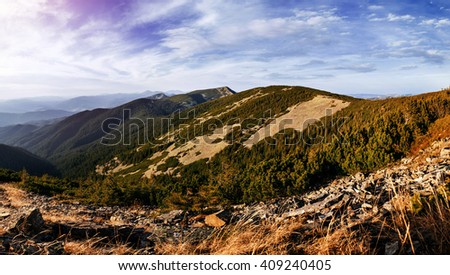 Great view of Rocky mountain, glowing in sunlight. Location place: Carpathian, Ukraine, Europe Artistic picture. Beautiful nature. Instagram toning effect.