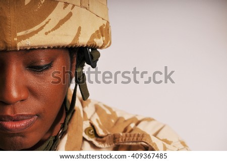 Pensive Black Female British Soldier