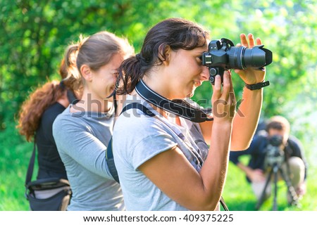 Participants in a course in nature photography outdoors
