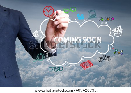 businessman hand draw cloud , icon cartoon with COMING SOON  text 