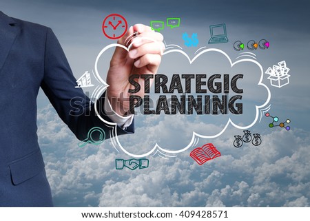 businessman hand draw cloud , icon cartoon with STRATEGIC PLANNING   text Royalty-Free Stock Photo #409428571
