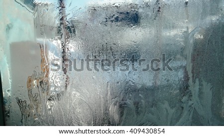 beautiful frost, ice patterns on window glass