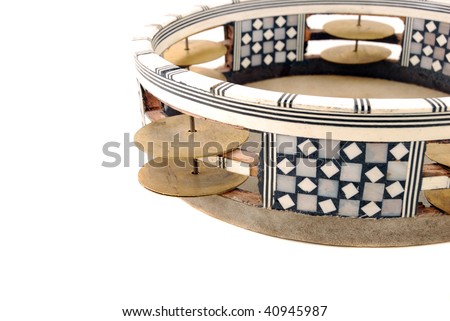 Tambourine with the tense skin and the inlaid rim with sonorous plates