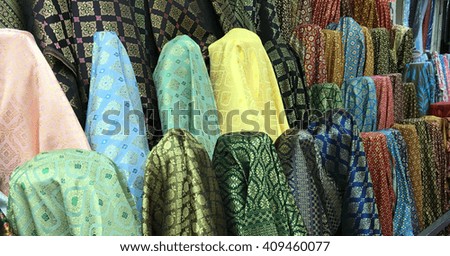 Thai tradition pattern fabric rolls background 05