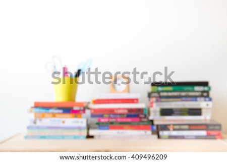 Books on the table background (Out of focus)