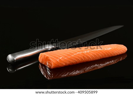 Fresh Salmon fillet on black background