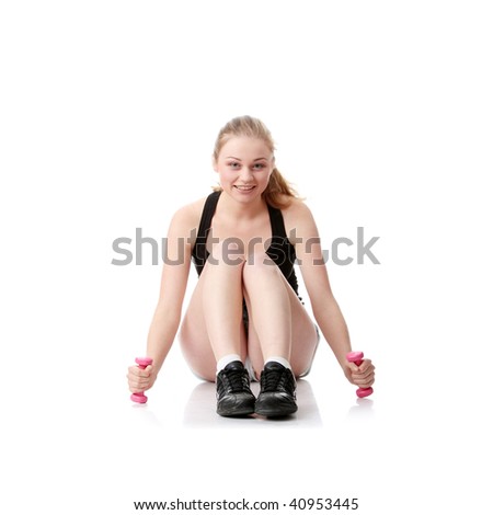 Beautiful young blonde exercising, isolated on white background