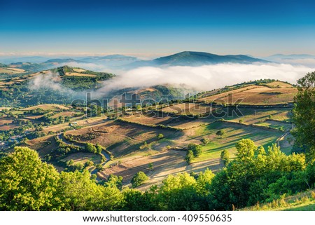 Foggy Landscape Galicia Spain  Royalty-Free Stock Photo #409550635