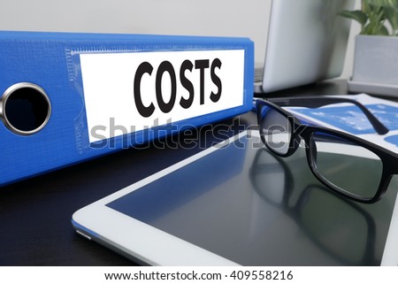 COSTS Concept  Office folder on Desktop on table with Office Supplies. ipad