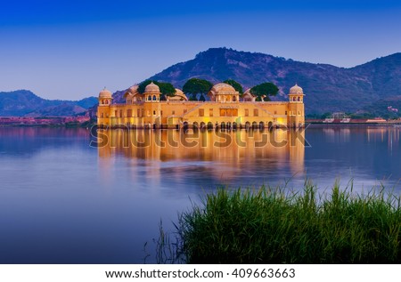 The palace Jal Mahal at night. Jal Mahal (Water Palace) was built during the 18th century in the middle of Man Sager Lake. Jaipur, Rajasthan, India, Asia Royalty-Free Stock Photo #409663663