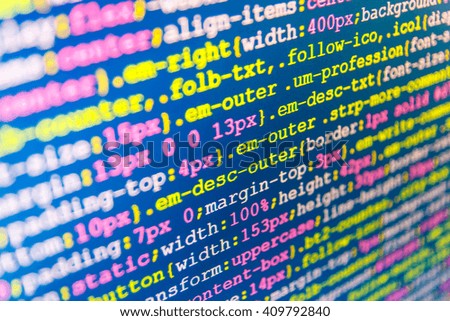  Website codes on computer monitor. Website programming code. Programming code abstract screen of software developer. Source code photo. Programmer developer screen. Technology background. 

