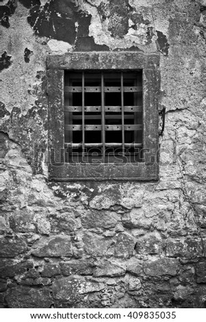 Old window with the bars black&white