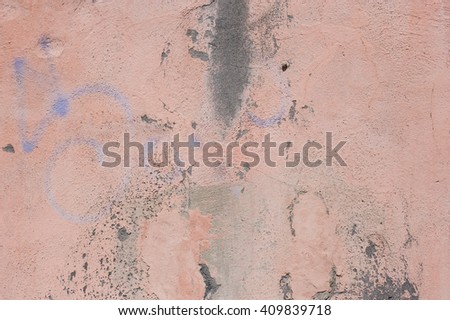 Old textured street wall in Rome, Italy