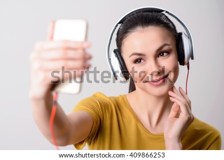 Positive girl listening to music 