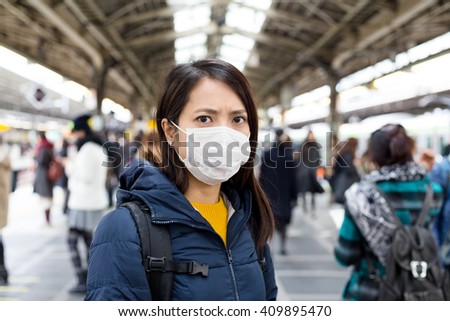 Woman wearing face mask at outdoor