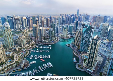 View on Dubai Marina skyscrapers and the most luxury superyacht marina,Dubai,United Arab Emirates Royalty-Free Stock Photo #409925923