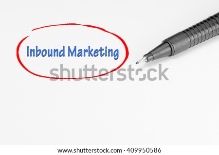 Inbound Marketing written on white paper - Business Concept