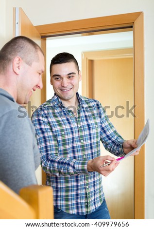 The young man asked to sign a document of his neighbor