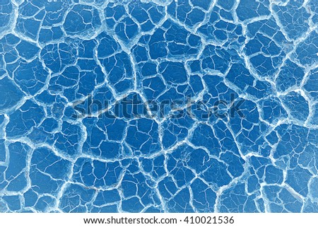 Abstract Crack soil on dry season/Global worming effect on blue color background